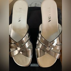 Prada silver metallic leather slide sandals.  Worn once!